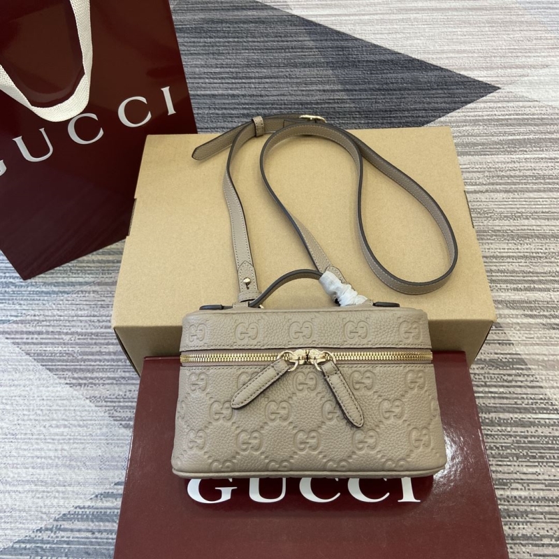 G*u*i top handle bags